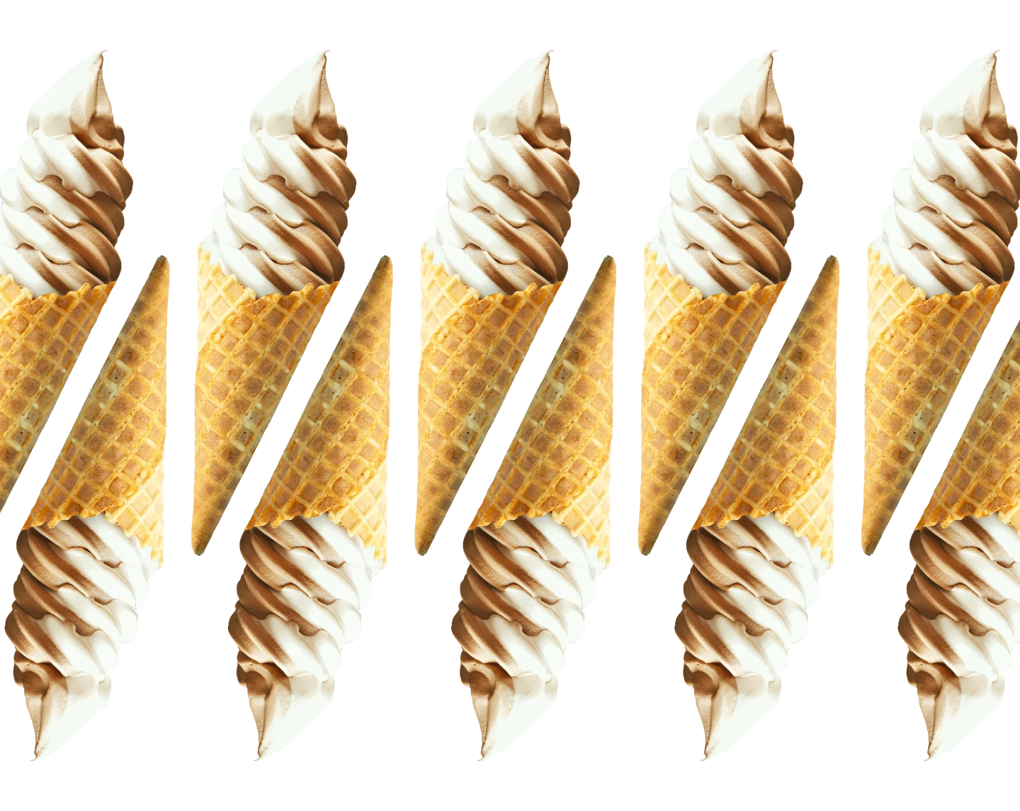 A row of Soft Serve Ice Cream in Waffle Cones